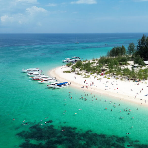 Many tourists enjoying their holiday on Bamboo Island in Krabi p